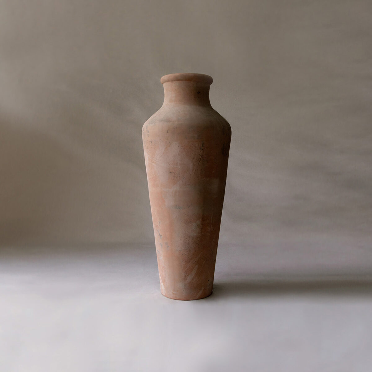 Tall terracotta pot